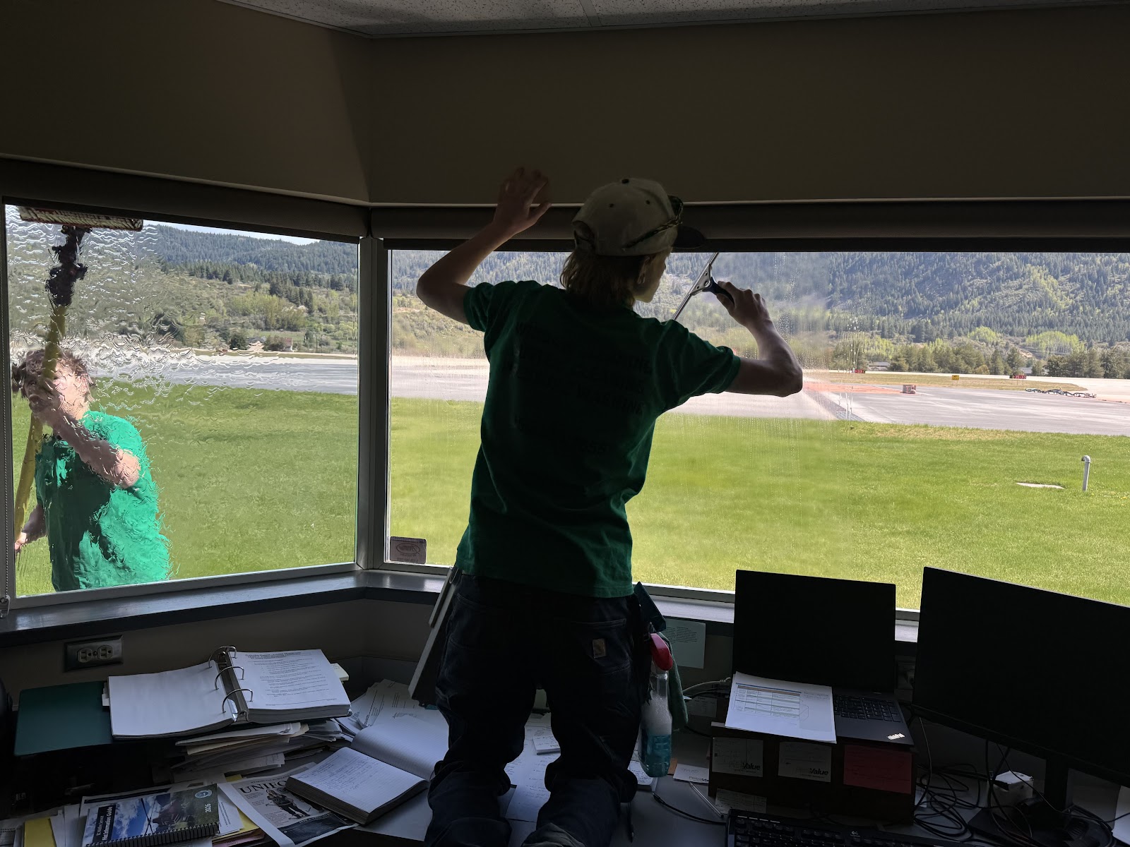 Grit & Grind team cleaning windows