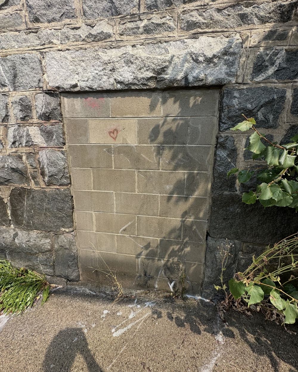 Block wall after graffiti removal, surface intact
