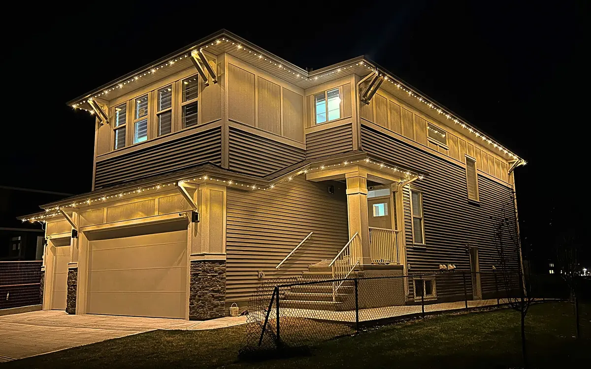 Modern two-storey home with warm white permanent lights